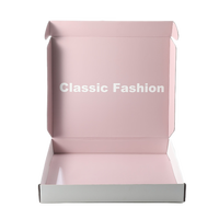 Boîte cadeau en carton ondulé pliable, écologique et recyclable, personnalisée, bicolore rose et blanc, avec impression de texte classique et tendance à l'intérieur.
