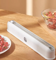 Nouveau coupe-film magnétique, matériau de qualité alimentaire, résistant à la chaleur et à la poussière, gadget de cuisine à fixer au réfrigérateur pour un usage domestique