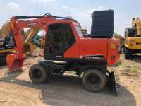 Excavatrice sur roues Doosan DX150w-9C de 14 tonnes d'occasion avec composants essentiels : moteur, engrenage, roulement DX150w