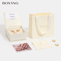 Boîte d'emballage pour bijoux en carton en forme de livre avec logo personnalisé Boyang, nouveau style, aimantée, pour boucles d'oreilles et colliers