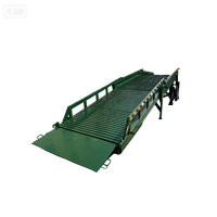 Plateforme de chargement mobile portable, niveleur de quai, élévateur hydraulique manuel, construction en acier à haute teneur en manganèse pour l'embordoirement de marchandises sur camion