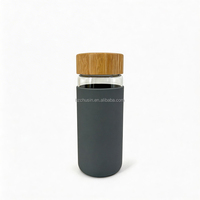 Bouteille d'eau en verre réutilisable de 530 ml avec manchon en silicone pour diverses occasions – Vente en gros