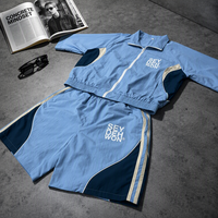 Ensemble deux pièces streetwear unisexe avec logo brodé personnalisé, survêtement oversize, veste en nylon et short en polyester pour homme