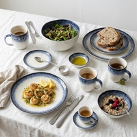 Service de table en céramique artisanale EKA, bleu et blanc moucheté, avec glaçure réactive, assiettes et bols pour la restauration et les mariages