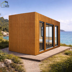 Casa Contenedor con Revestimiento de Madera y Grandes Ventanales Cabaña Modular Prefabricada para Vida al Aire Libre - Product Image 2