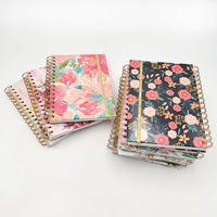 Vente en gros A5 Bagues en or Journal scolaire Logo personnalisé Carnets imprimés à spirale pour étudiants Planificateur mensuel Livres à couverture rigide