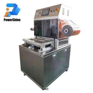 Machine d'emballage sous atmosphère modifiée (ORM) pour aliments cuits, poisson, avec plateau sous vide, scellage cutané et rinçage à l'azote - Product Image 1