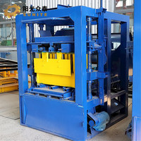 Machine à fabriquer des blocs de béton creux QT4-26 entièrement automatique de haute qualité, prix de la machine à fabriquer des briques