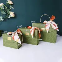 Vente en gros d'emballages cadeaux romantiques, boîte cadeau pliable de luxe pour ensemble de bougies avec poignée