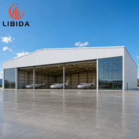 Hangar d'avion en structure métallique préfabriquée, bâtiment métallique aéronautique sur mesure pour l'entretien et le stockage à l'aéroport