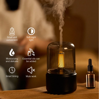 Diffuseur d'huiles essentielles à la lumière des bougies, humidificateur d'air portable de 120 ml, brumisateur à vapeur froide, 8 à 12 heures avec lumière LED nocturne