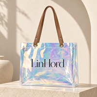 Sac fourre-tout léger en PVC holographique à motif de dessin animé, avec logo personnalisé et longues poignées, idéal pour le shopping quotidien, les trajets en ville et les boutiques de mode.