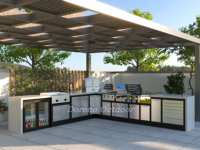 Ensemble de cuisine extérieure de luxe avec îlot barbecue, pièce maîtresse pour la cuisson, doté de sièges de bar et de niches de présentation pour l'amusement en cour