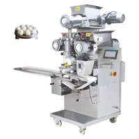 Machine de remplissage de pâte commerciale pour l'égyptien Aish Baladi avec fabricant de desserts farcis au pain sucré aux dattes