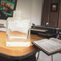 Bouteille diffuseur en verre d'arôme sans flamme carrée transparente personnalisée avec bouchon à vis réutilisable et 100 pièces de quantité minimale de commande