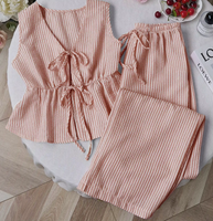 Ensemble deux pièces décontracté pour femme à rayures, comprenant un débardeur sans manches à nouer sur le devant et un pantalon long ample à taille élastique, idéal pour la maison