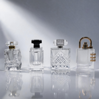 Flacon de parfum en verre transparent personnalisé de 50 ml, flacon de parfum cylindrique à fond épais, flacon de parfum vide en verre avec bouchon