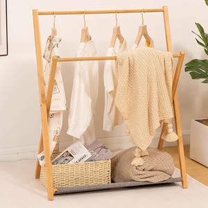 Simple and multifunctional <b>clothes</b> <b>rack</b> with cross-shaped design, perfect for bedside, bedroom, or children's use. - Product Image 4