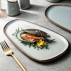Juego de platos de cena irregulares de cerámica Chaozhou, platos ovalados rectangulares oblongos de porcelana gris reactiva para bonito restaurante - Product Image 1