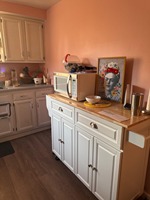 Îlot de cuisine roulant moderne blanc durable et imperméable avec roulettes, 2 tiroirs supérieurs et 2 armoires de rangement pour cuisine et salle à manger