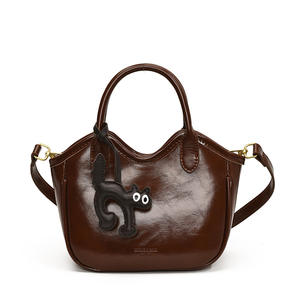 Sac à main en cuir véritable pour femme, élégant, en cuir de vachette souple, avec fermeture boutonnée, nouveau sac à main en cuir véritable - Product Image 1