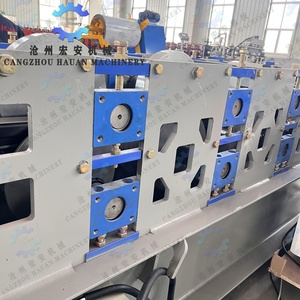 เครื่องขึ้นรูปและเชื่อมคานชั้นวางแบบป้อนอัตโนมัติ HAUAN พร้อมมอเตอร์เกียร์ PLC และลูกปืน-38.5 กิโลวัตต์ 380 โวลต์ ใช้งานง่าย - Product Image 4