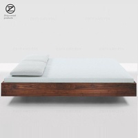 Lit tatami bas sans tête de lit en noyer noir de style nordique japonais, sur mesure pour chauffage au sol et gîtes