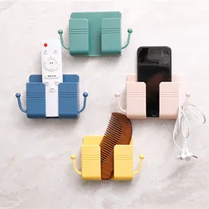 Popular Stock Multifunction New Wall Phone Holder Adhesive Mobile Phone Wall Charger Organizer Holder And Remote Control Stand