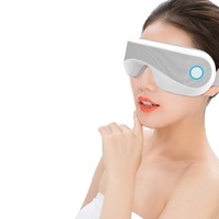 Masseur oculaire intelligent pliable en tissu de qualité supérieure avec fonction de chauffage, de vibration, de contrôle du temps et de musique, pour le soin des yeux et la relaxation musculaire