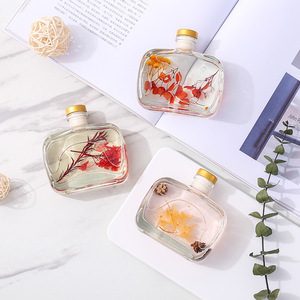 Diffuseur d'huiles essentielles sans flamme 100 ml, avec fleur stabilisée en forme d'eau décorative, pour assainisseur d'air domestique et parfum d'intérieur élégant - Product Image 1