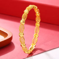 Vente en gros de bracelets creux plaqués or 24 carats, en alliage, larges, à motifs floraux en filigrane, bijoux de mode de mariage de Dubaï pour femmes