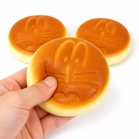Jouet Squishy en forme de pain de dessin animé, à remontée lente, avec motif facial en relief, doré, anti-stress, décompression, décoration de bureau, cadeau