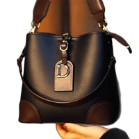 Sac polyvalent en cuir PU pour femmes, nouveau modèle à la mode, sac à bandoulière portable de grande capacité, sac seau