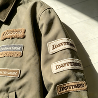 Veste de travail en toile de coton lavée pour homme OEM, avec plusieurs patchs en chenille, col en velours côtelé, style streetwear, veste bomber décontractée pour homme