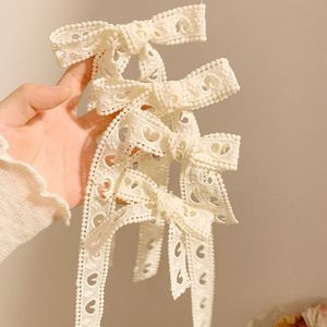 Pinza para el cabello con diseño de corazón de encaje superdelicado y hueco, lazo dulce con cinta, accesorio para cabello largo y corto, a la moda para mujeres. - Product Image 1