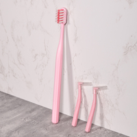Brosse à dents jetable portable de haute qualité en forme de U pour adultes, avec brosse interdentaire, pour un nettoyage buccal orthodontique personnalisé en usine