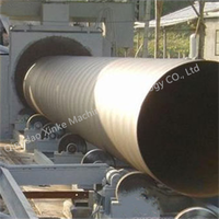 Qingdao Xinke passer à travers un grand tuyau d'acier externe propre industriel sablage convoyeur Type grenailleuse