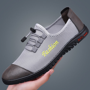 Zapatillas de deporte informales de malla para hombre, ligeras, transpirables, sin cordones, color gris y negro, con suela suave, para correr - Product Image 1