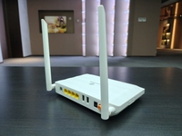 BRMC HG6145D1 XPON ONU 4GE+1TEL+2USB 2.4G 5G WIFI FTTH ONT Peralatan Serat Optik Bahasa Inggris ONU Dual Band WIFI Gpon ONT HG6145D1