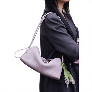 Novedad de Primavera 2026: Bolso de Mano Sencillo para Mujer, de Cuero Genuino y Poliéster, con Cremallera y Borla, Estilo Coreano de Alta Gama, Textura Exclusiva, Tipo Almohada - Product Image 1
