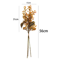 Vente en gros de branche artificielle de Skimmia avec fruits et feuilles d'automne de 56 cm pour la décoration d'hôtels