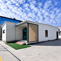 Maison préfabriquée modulaire de luxe autonome à énergie solaire, extensible, de 40 pieds, en forme de A, avec façade vitrée, pour hôtel ou complexe hôtelier