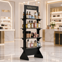 Présentoirs de vente au détail noirs personnalisés pour huiles corporelles, présentoirs de sol en métal pour maquillage, pour magasins de cosmétiques