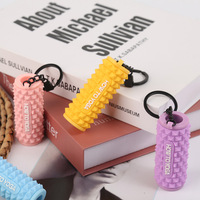 Porte-clés de massage créatif et portable anti-stress, en forme de rouleau de mousse de yoga, avec pendentif de sac design, pour professionnels intégrés