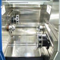 Tour CNC YH52ST à double broche et double tourelle, avec banc rigide en fonte, pour composants d'arbre automobile et usinage de métaux