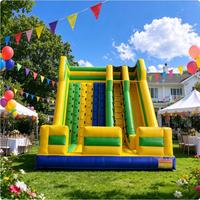 Mur d'escalade gonflable commercial à double toboggan en PVC pour événements extérieurs
