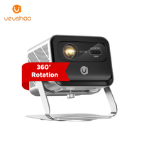 Projecteur portable mini VEVSHAO 1080P 2200 lumens ANSI V80 avec mise au point automatique, support réglable à 360 degrés, haut-parleurs intégrés, compatible 3D
