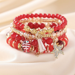 Bracelet bohème multicouche perlé avec breloques étoile de mer et poisson pour femme, accessoire de mode pour la plage et les vacances - Product Image 1