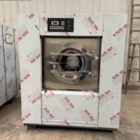 Machine d'élimination des saletés entièrement automatique de 30 kg pour les écoles, avec grande capacité, paramètres programmables et utilisation facile.