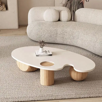 Table basse ovale en bois massif blanc nordique, finition brillante Wabi-Sabi, forme irrégulière, taille personnalisable, luxe avec trois pieds